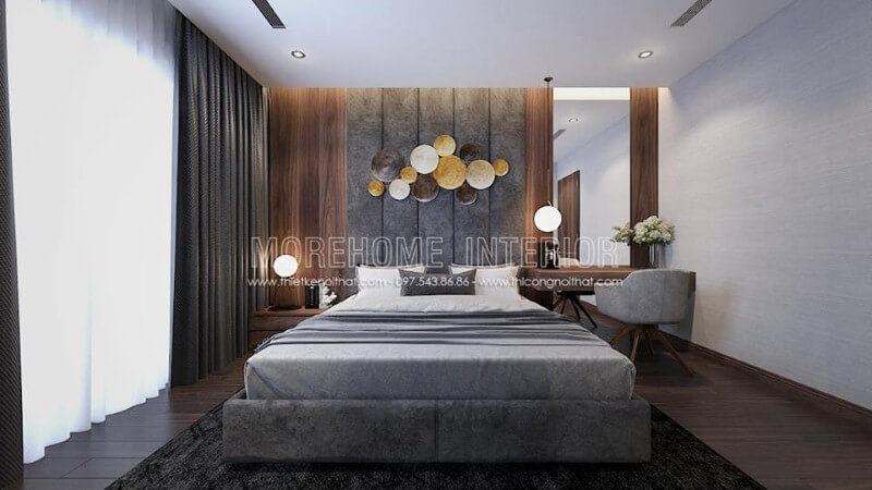 Gỗ ốp đầu giường ấn tượng với đường vân đẹp mắt cùng gam trầm tạo nên vẻ đẹp sang trọng cho phòng ngủ hiện đại. Thiết kế nội thất