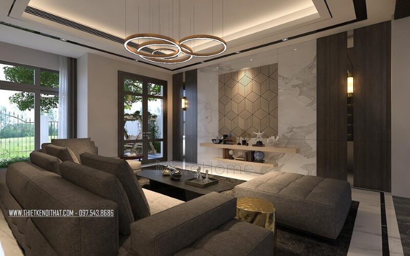 Sắp xếp không gian phòng khách rộng, hiện đại ấn tượng với ý tưởng sử dụng gam màu đối lập từ xám trắng cùng đồ nội thất cao cấp. Thiết kế nội thất
