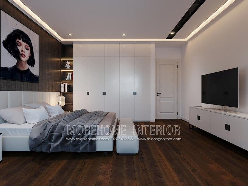 Trang trí nội thất phòng ngủ ấn tượng với tủ quần áo sơn trắng kết hợp kệ trang trí sát giường ngủ. Thiết kế nội thất