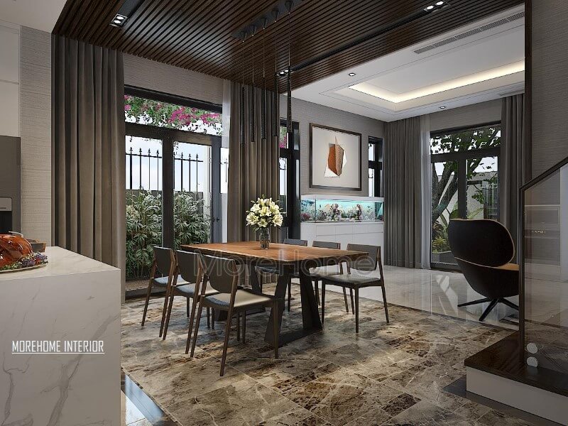Thiết kế phòng ăn hiện đại thông thoáng, chan hòa với thiên nhiên từ hệ cửa lớn giúp ánh sáng lan tỏa tối đa nhưng vẫn chắn nắng kịp thời từ rèm 2 lớp. Thiết kế nội thất