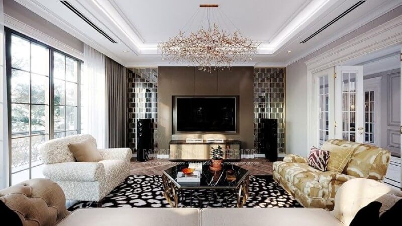 Vách kim loại mạ vàng kết hợp cùng tấm ốp tường đơn sắc tạo nên không gian sang trọng cho biệt thự, nhà phố. Thiết kế nội thất