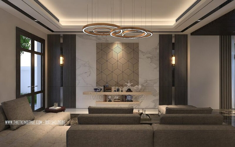 Bố trí phòng khách hiện đại ấn tượng với đá ốp tường cao cấp cùng họa tiết 3D độc đáo. Thiết kế nội thất